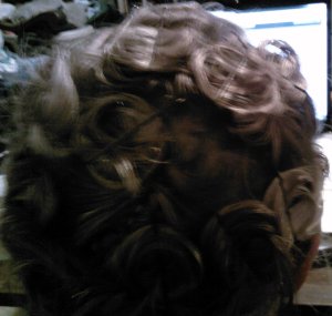 Blurry AND dark--but I was trying to take a picture of the back of my head with a cell phone.