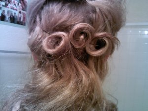 I started making pincurls at the middle back of my head, working my way out.