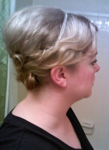I took a silver necklace, put bobby pins on either side, and hooked it into my hair like a little headband.  I used two more pins on each side to secure it, hiding the pins under the side waves.