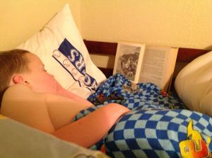 Here is Thor, having bored himself to sleep, reading Genesis.