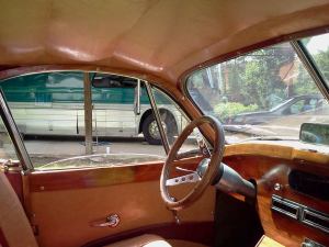 Dad cut, finished, and fitted all the wood.  That dash and door are fully custom.