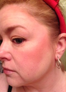 Then, I used my Rockateur bronzer from Benefit to make contour.  This is absolutely the wrong color for this work, but it's all I had.  I'll be picking up some ELF colors soon.  The contour went really close to my hairline to oval out the round, and in a Nike swoosh right on the bone of my cheekbone, and in another swooshy shape under my jawline, starting BEHIND MY EAR.  That's critical.  It makes the shadowing look more natural.   When I blended (and you have to blend like a fiend) I blended into my ear and all the way down my neck-also critical if you want to avoid looking like your head is pasted on.